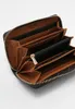 An open wallet showing its compartments. Anteprima dell’immagine prodotto