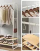 Collage of images showing a clothing rack with clothes, shoes, and accessories, and close-ups of the clothing rack's features. Náhled obrázku produktu
