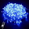 A tangled string of blue LED lights with a black power adapter in the bottom left corner. Produktbild-Vorschau