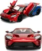 A toy model of a Ford GT car, with its doors and hood open, shown from two different angles. Náhled obrázku produktu
