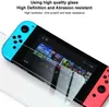 A screen protector is being applied to a Nintendo Switch. Produktbild-Vorschau