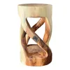 A wooden stool with a carved, twisted base. Anteprima dell’immagine prodotto