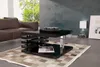 A modern living room scene with a couch, coffee table, rug, and lamp. Náhled obrázku produktu