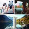 Collage of images showing people doing yoga on a beach, a person in a car with a sunset view, and a water bottle in a natural landscape. Produktbild-Vorschau