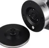 Close-up view of the base of an electric kettle and its detached power base. Produktbild-Vorschau
