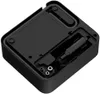A black portable air compressor with its accessories stored inside. Produktbild-Vorschau