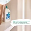 A bottle of cleaning product on a shelf, with a promotional text overlay. Produktbild-Vorschau
