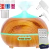 A product shot of an aroma diffuser with accessories and a remote control. Náhled obrázku produktu