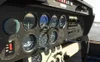 Close-up view of an aircraft cockpit dashboard with various gauges and controls. Anteprima dell’immagine prodotto