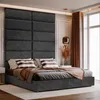 A bedroom scene with a bed featuring a large upholstered headboard. Anteprima dell’immagine prodotto