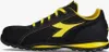 A side view of a black and yellow Diadora work shoe against a white background. Náhľad obrázku produktu