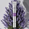 A tube of eye cream is placed in front of a bouquet of lavender. Produktbild-Vorschau