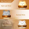 A collage of images showing a bear-shaped night light in different modes and a person holding a baby. Produktbild-Vorschau
