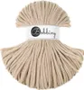 A spool of beige cord on a white background. Podgląd zdjęcia produktu