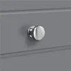A close-up of a drawer knob on a gray surface. Produktbild-Vorschau