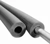 Two pieces of gray foam pipe insulation are shown on a white background. One piece is shown from the end, revealing the hollow interior, while the other is shown from the side with a metal pipe inserted into it. Produktbild-Vorschau