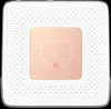 A top-down view of a rose gold and white air conditioner control panel. Produktbild-Vorschau