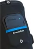 A close-up of a black compression sleeve with a device attached. Podgląd zdjęcia produktu