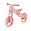 A wooden balance bike for children, shown from a three-quarter front angle against a white background. Náhľad obrázku produktu