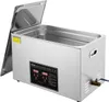 A silver ultrasonic cleaner with its lid open, revealing a stainless steel interior basket. The front panel features a digital display and controls, and a small drain valve is visible on the right side. Náhľad obrázku produktu