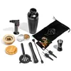 A collection of cocktail making tools and smoking accessories laid out on a white background. Voir les images du produit