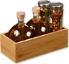 A set of oil and spice bottles in a wooden holder. Produktbild-Vorschau