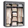 A portable wardrobe filled with clothes and storage boxes. Anteprima dell’immagine prodotto