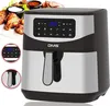 An air fryer with a plate of chicken wings and dipping sauces in the background. Produktbild-Vorschau