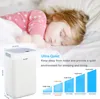 A child sleeping peacefully next to a dehumidifier. Produktbild-Vorschau
