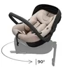 A baby car seat is shown on a stand, with a graphic indicating a 90-degree rotation. Produktbild-Vorschau