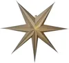A beige, seven-pointed paper star lantern with small perforations that allow light to shine through. Podgląd zdjęcia produktu