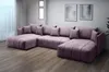 A U-shaped sofa in a modern living room setting. Náhľad obrázku produktu