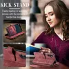 A woman is using a phone case with a kickstand feature while reading. Produktbild-Vorschau