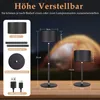 A product image showing two adjustable LED table lamps with dimensions and components labeled, set against a blurred background of a tent at night. Náhľad obrázku produktu