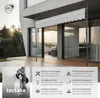 An awning is extended from a modern building onto a wooden deck. Produktbild-Vorschau