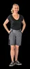 A woman is standing and posing for a product photo. Produktbild-Vorschau