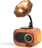 A retro-style wireless speaker resembling a vintage gramophone. Produktbild-Vorschau