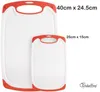 Two white cutting boards with red trim are shown side-by-side, with dimensions indicated by text. Anteprima dell’immagine prodotto