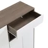 A close-up view of a furniture item with an open drawer. Produktbild-Vorschau