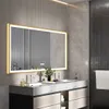A modern bathroom vanity with a large LED mirror above it. Náhled obrázku produktu