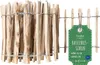 A close-up view of a wooden garden fence roll with a product tag.