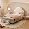 A child's bedroom with a bed, nightstand, and desk. Produktbild-Vorschau