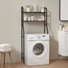 A washing machine with a storage rack above it in a bathroom. Produktbild-Vorschau