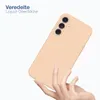 A hand holding a peach-colored phone case. Produktbild-Vorschau
