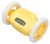 A yellow alarm clock with wheels, designed to move when the alarm goes off. Podgląd zdjęcia produktu