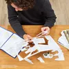 A person is assembling a 4D-build model of Hedwig from Harry Potter. Produktbild-Vorschau