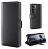 A collage of images showing a black leather flip phone case for a Xiaomi Redmi 15 / 15 5G, including a close-up of the case, the case with the phone inside, and the phone in the case propped up to watch a movie. Produktbild-Vorschau