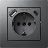 A close-up view of a wall socket with integrated USB ports. Produktbild-Vorschau