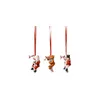 Three Christmas ornaments hanging from red ribbons against a white background. Podgląd zdjęcia produktu