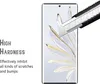 A close-up of a smartphone screen protector being tested for hardness with a utility knife. Produktbild-Vorschau